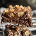 ['Close-up of a healthy Ferrero Rocher, showcasing the chocolate coating and hazelnut filling.', 'Side view of a nutritious Ferrero Rocher with visible cocoa dust and chunks of dark chocolate.', 'Detailed image of a homemade Ferrero Rocher featuring hazelnuts and a shiny chocolate exterior.', 'A vibrant Ferrero Rocher positioned on a clean surface, highlighting its rich texture and ingredients.']