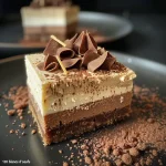 Close-up of creamy white chocolate mousse in a glass dish.